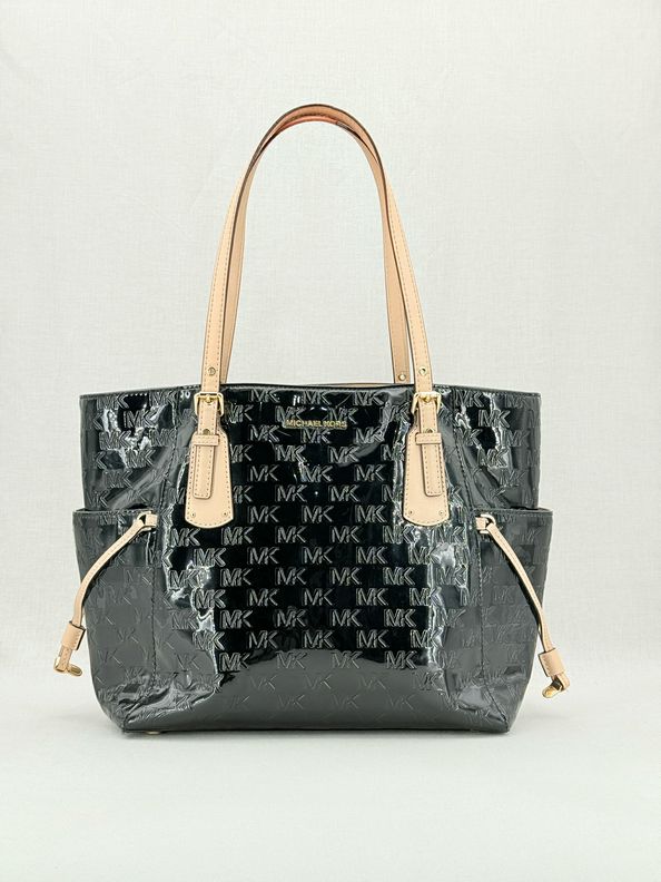 Pre - loved MICHAEL KORS Voyager Black Logo Embossed Tote Bag at Reems Closet