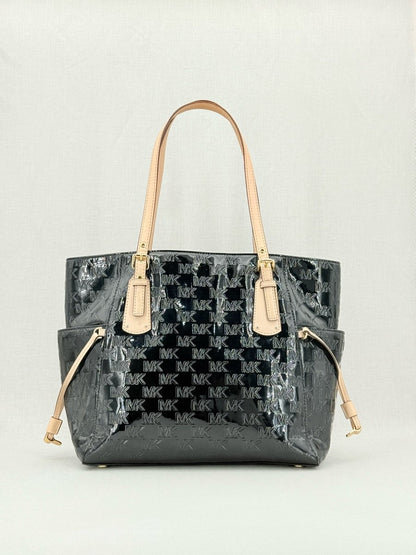 Pre - loved MICHAEL KORS Voyager Black Logo Embossed Tote Bag at Reems Closet