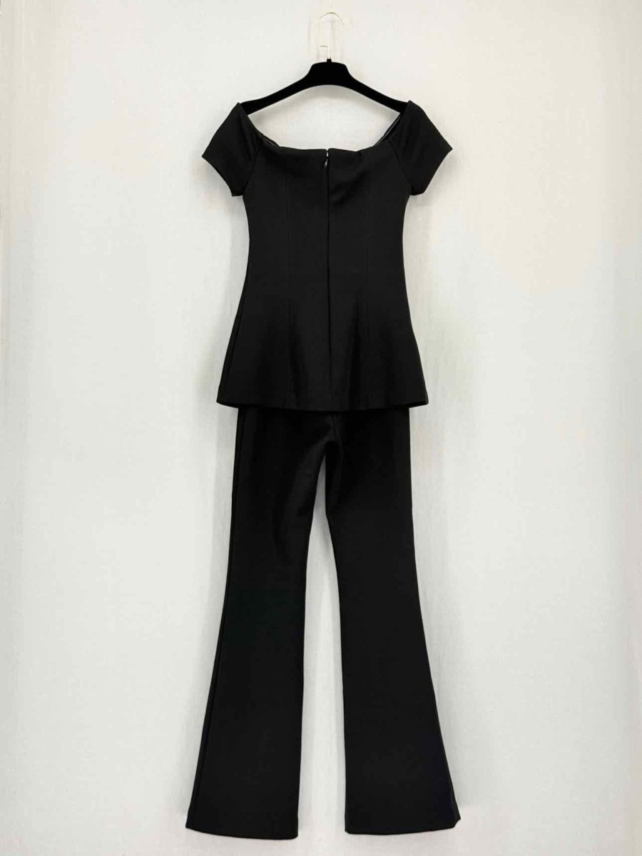 Pre-loved MISHA Black Size Small Jumpsuit at Reems Closet