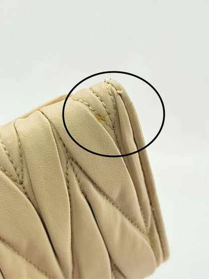 Pre - loved MIU MIU Beige Continental Wallet at Reems Closet