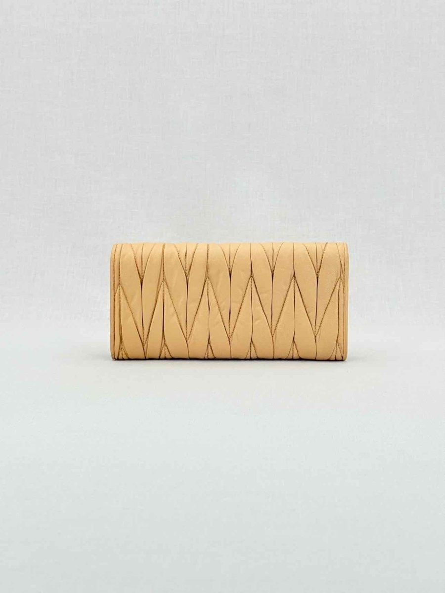 Pre - loved MIU MIU Beige Continental Wallet at Reems Closet