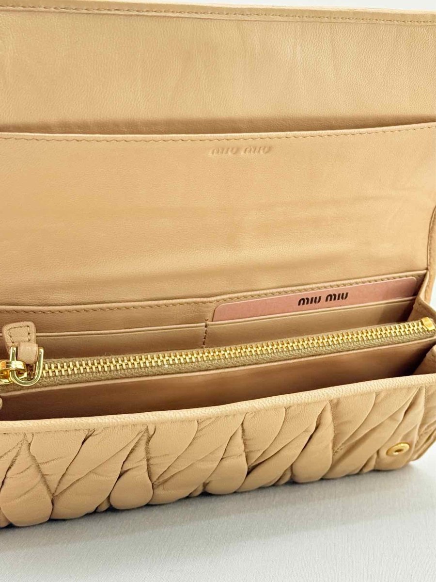 Pre - loved MIU MIU Beige Continental Wallet at Reems Closet