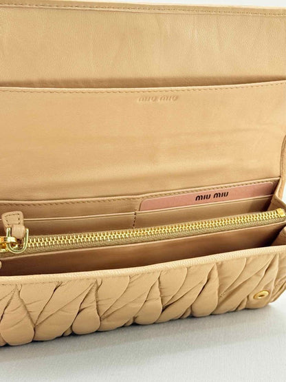 Pre - loved MIU MIU Beige Continental Wallet at Reems Closet