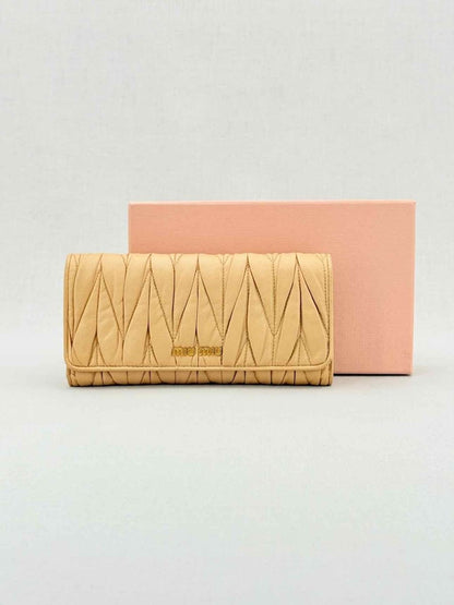 Pre - loved MIU MIU Beige Continental Wallet at Reems Closet
