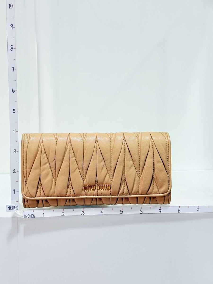Pre - loved MIU MIU Beige Continental Wallet at Reems Closet