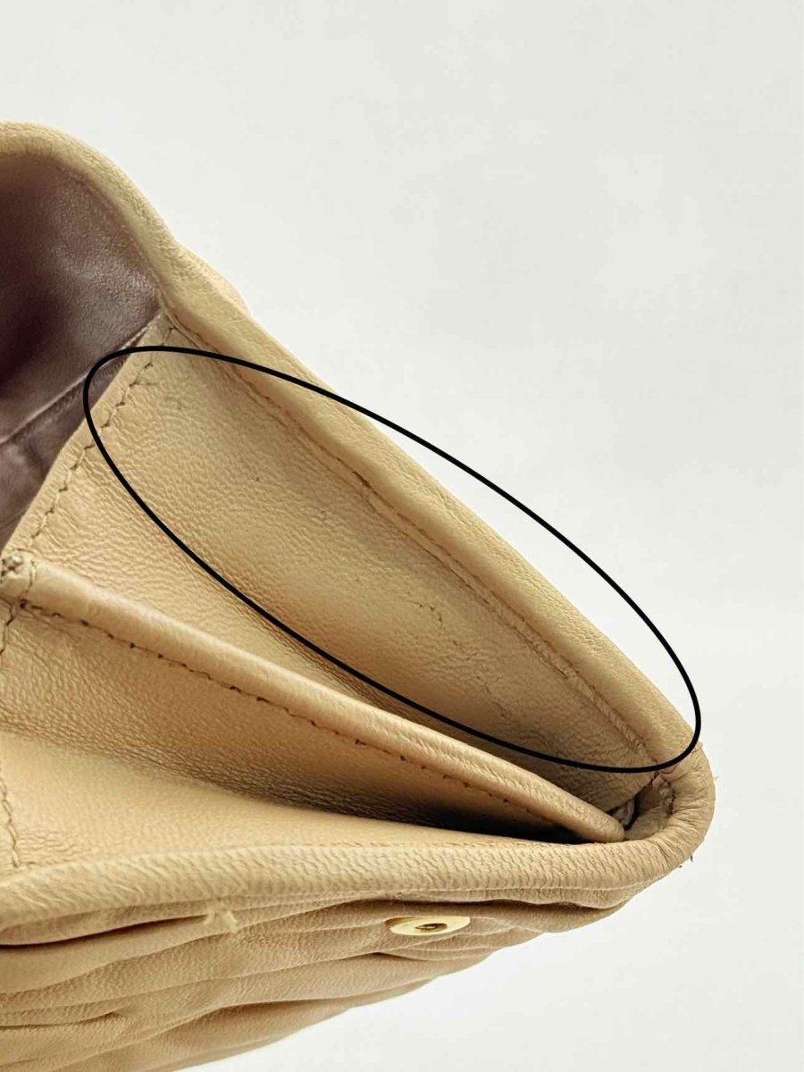 Pre - loved MIU MIU Beige Continental Wallet at Reems Closet