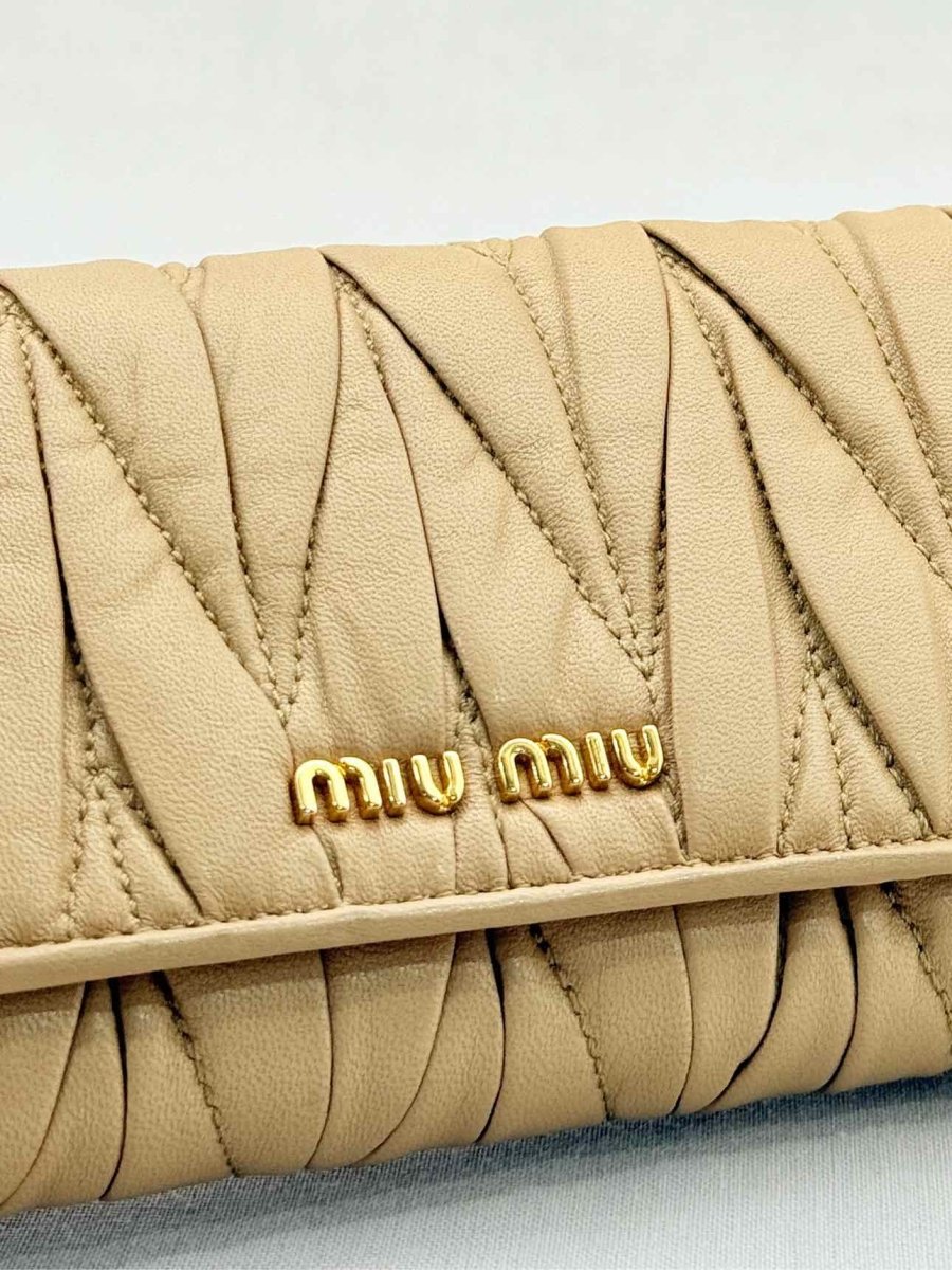 Pre - loved MIU MIU Beige Continental Wallet at Reems Closet