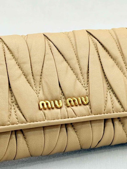 Pre - loved MIU MIU Beige Continental Wallet at Reems Closet