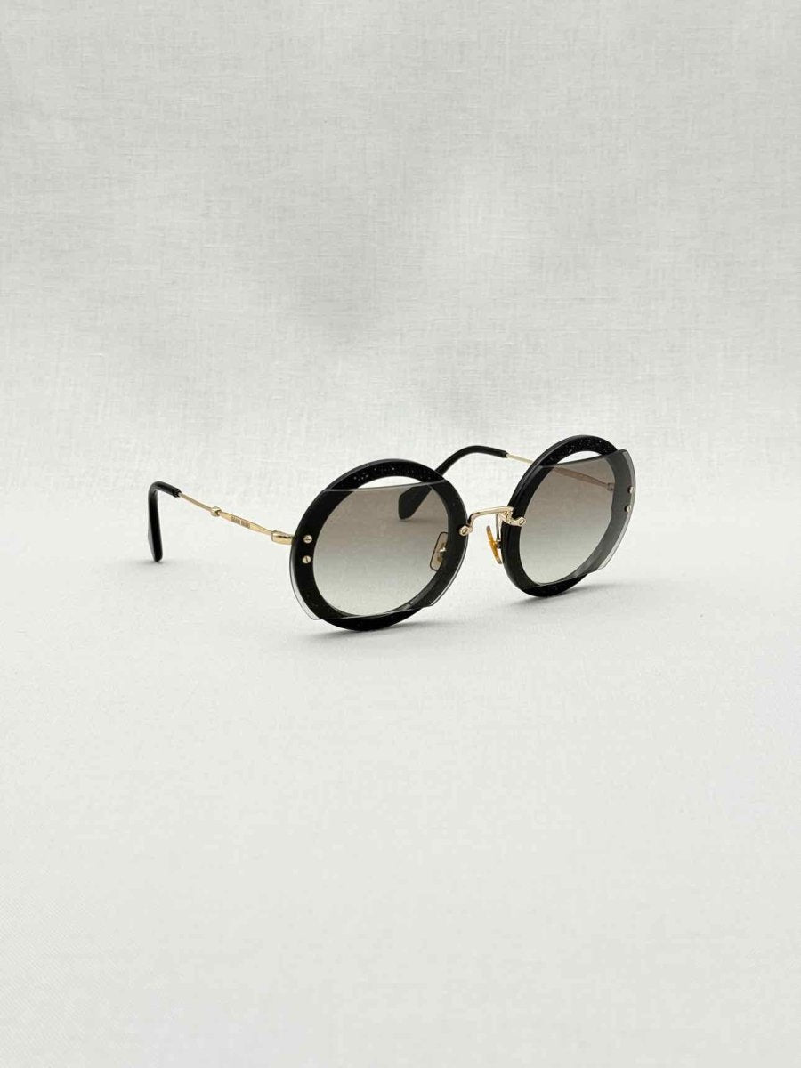 Pre - loved MIU MIU Black Sunglasses at Reems Closet