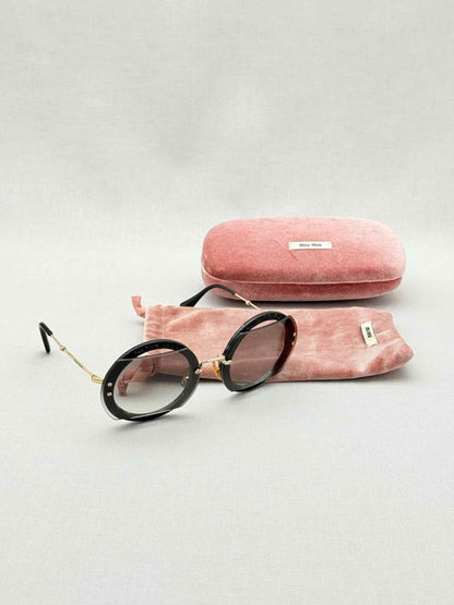 Pre - loved MIU MIU Black Sunglasses at Reems Closet