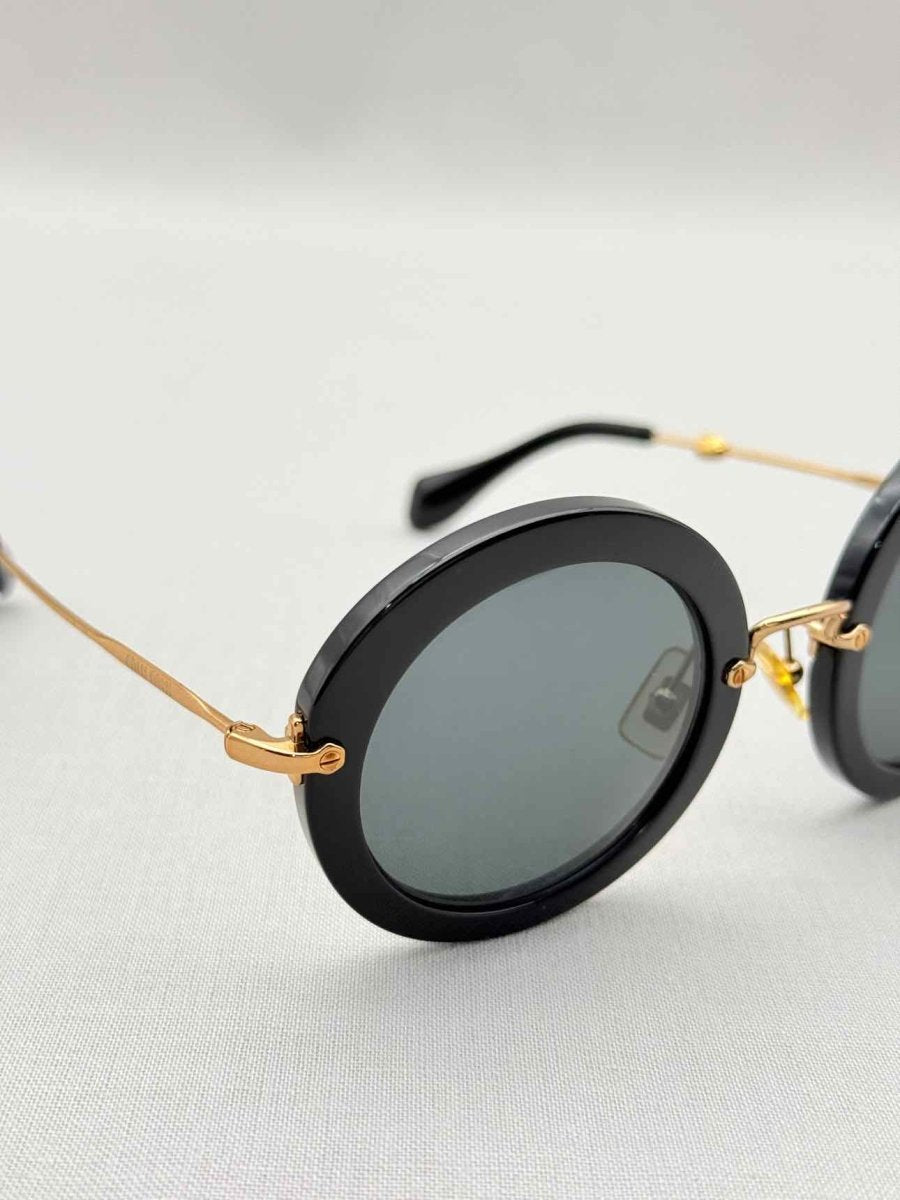 Pre - loved MIU MIU Black Sunglasses at Reems Closet