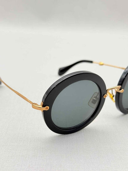 Pre - loved MIU MIU Black Sunglasses at Reems Closet