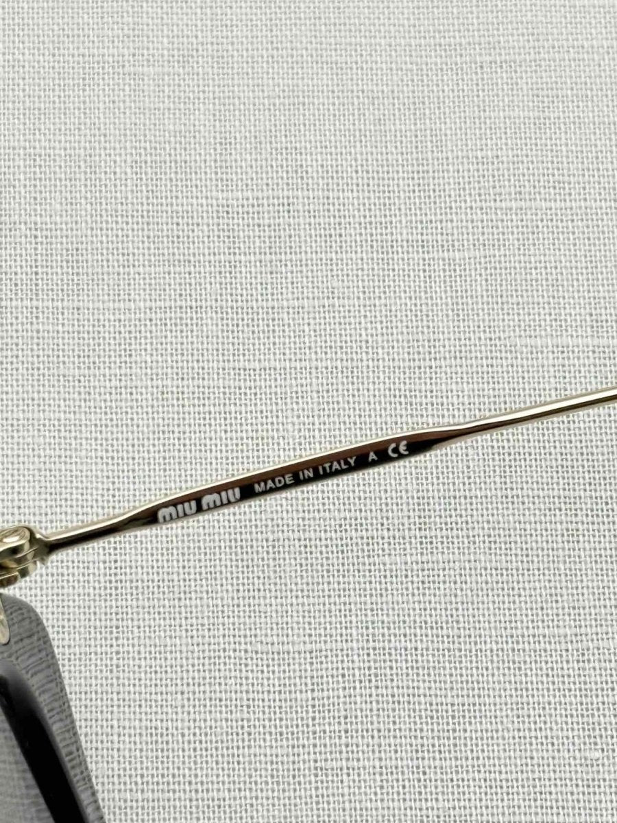 Pre - loved MIU MIU Black Sunglasses at Reems Closet