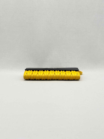 Pre-loved MIU MIU Black & Yellow Crossbody at Reems Closet