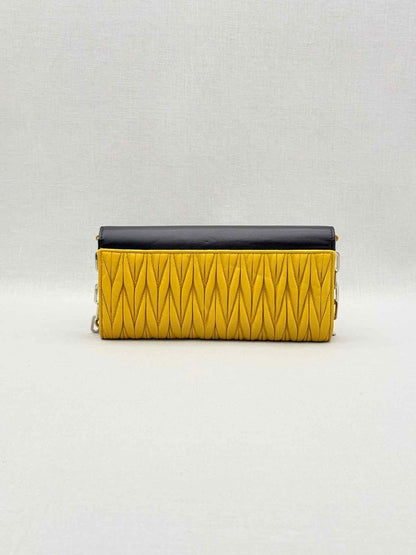 Pre-loved MIU MIU Black & Yellow Crossbody at Reems Closet