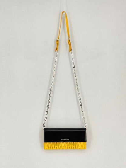 Pre-loved MIU MIU Black & Yellow Crossbody at Reems Closet