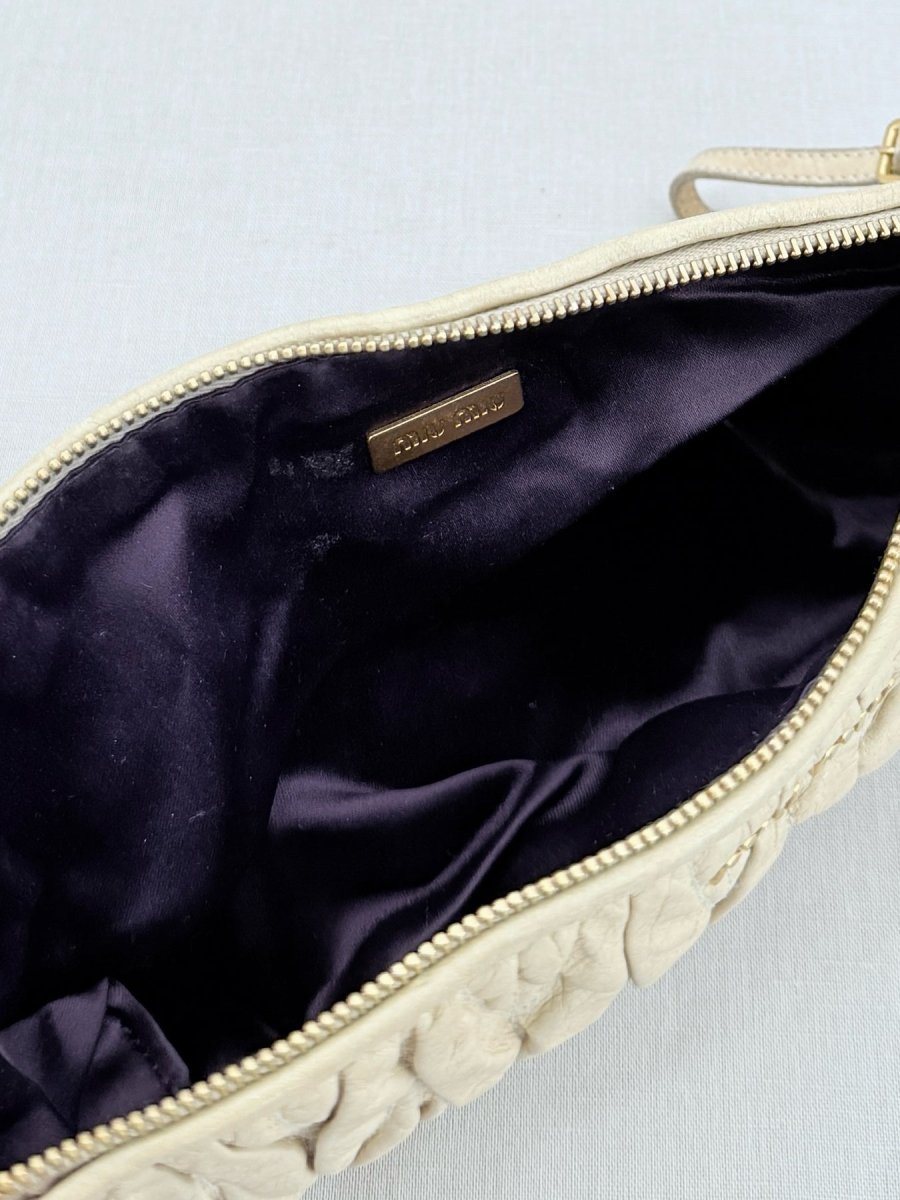 Pre - loved MIU MIU Cream Clutch at Reems Closet