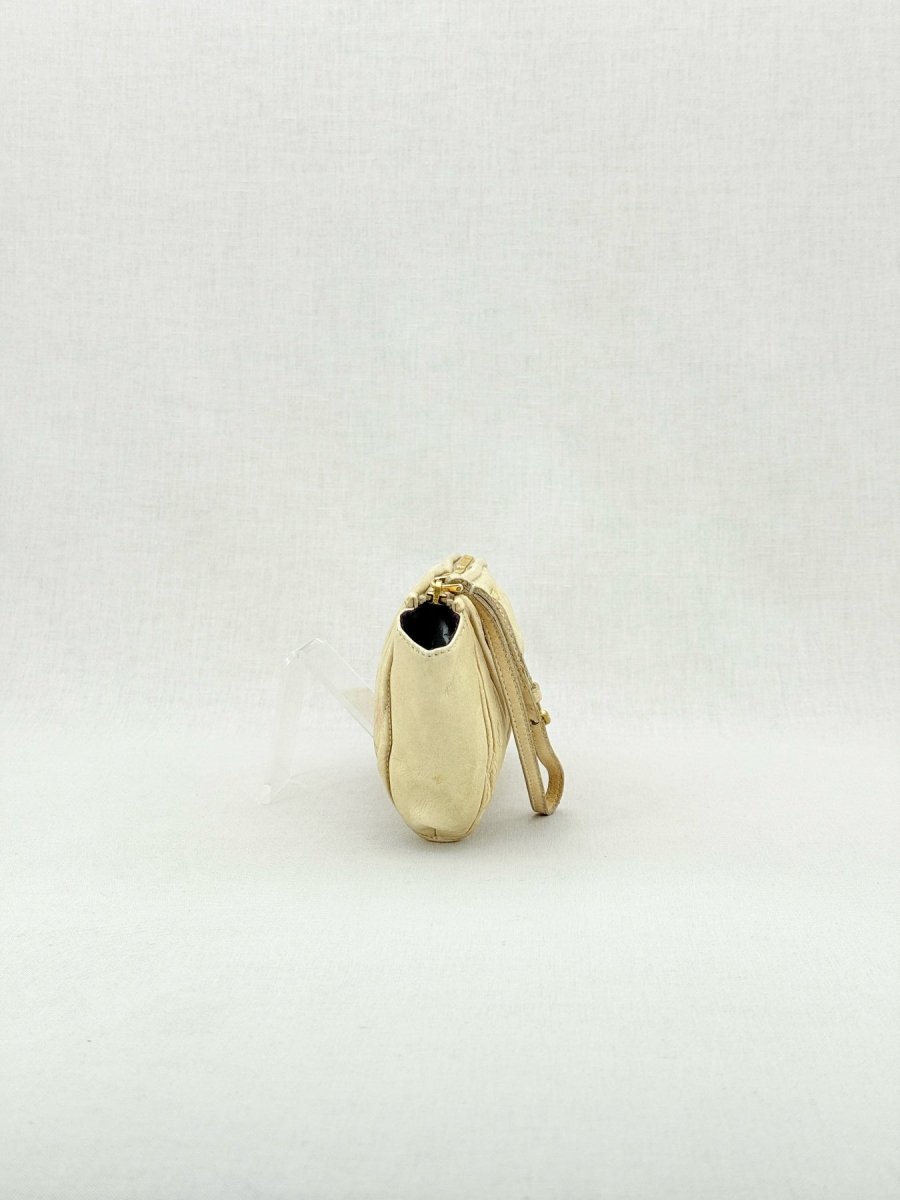 Pre - loved MIU MIU Cream Clutch at Reems Closet