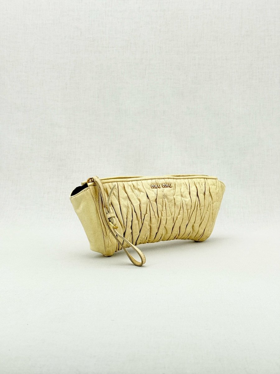 Pre - loved MIU MIU Cream Clutch at Reems Closet