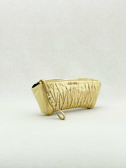 Pre - loved MIU MIU Cream Clutch at Reems Closet