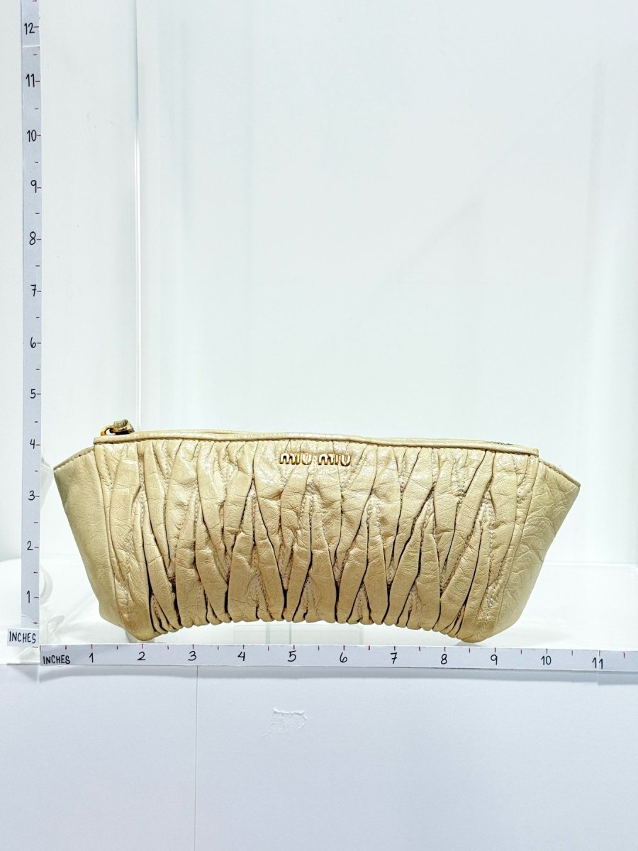 Pre - loved MIU MIU Cream Clutch at Reems Closet
