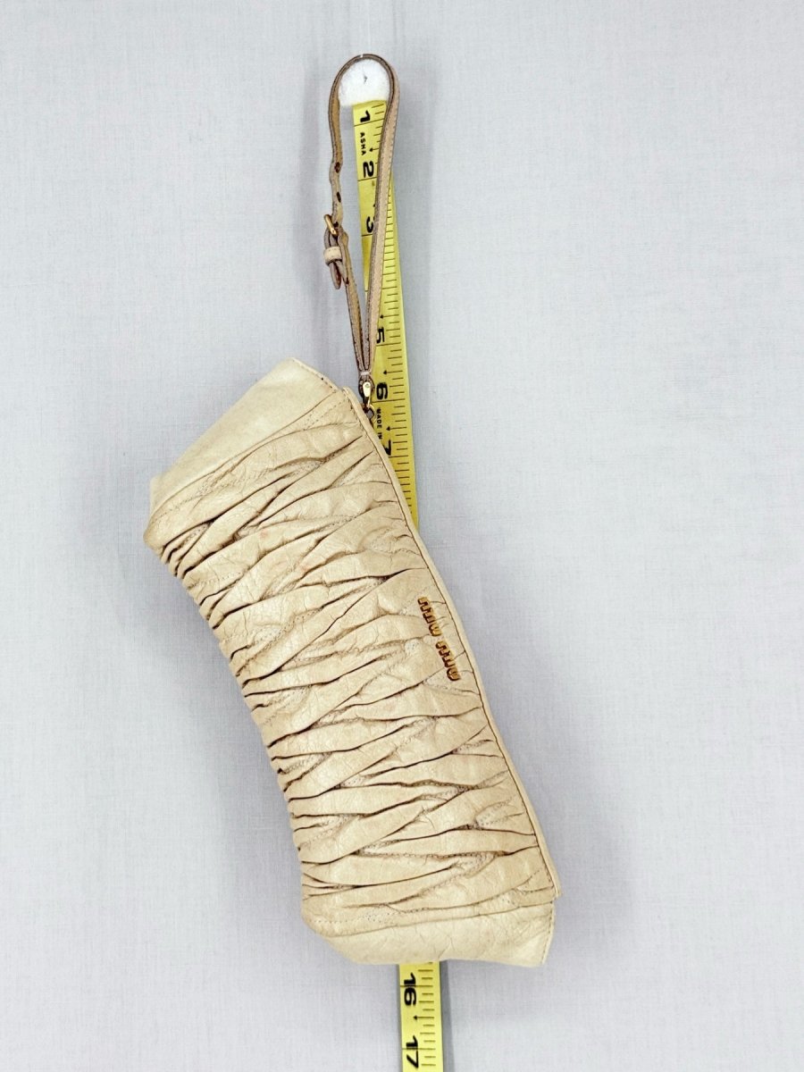 Pre - loved MIU MIU Cream Clutch at Reems Closet