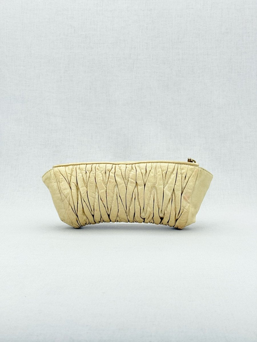 Pre - loved MIU MIU Cream Clutch at Reems Closet