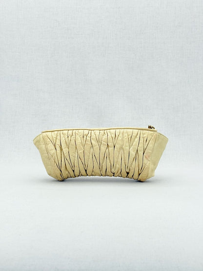 Pre - loved MIU MIU Cream Clutch at Reems Closet