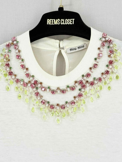 Pre - loved MIU MIU Cream Size XSmall T-shirt at Reems Closet