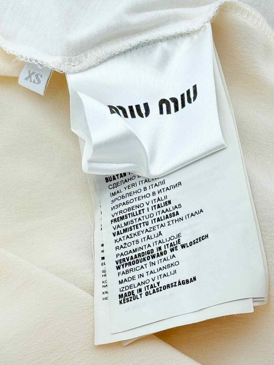 Pre - loved MIU MIU Cream Size XSmall T-shirt at Reems Closet