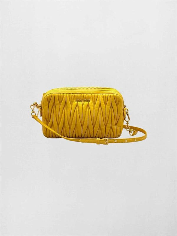 Pre-loved MIU MIU Double Zip Yellow Crossbody at Reems Closet
