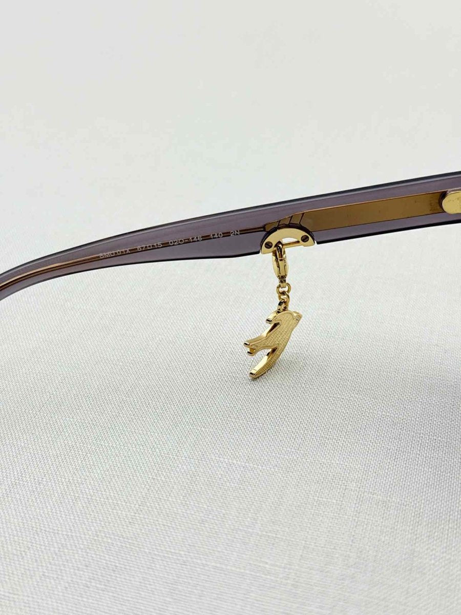 Pre - loved MIU MIU Purple Sunglasses at Reems Closet