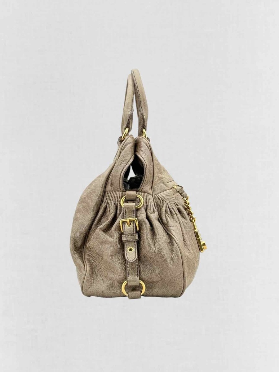 Pre - loved MIU MIU Taupe Top Handle at Reems Closet