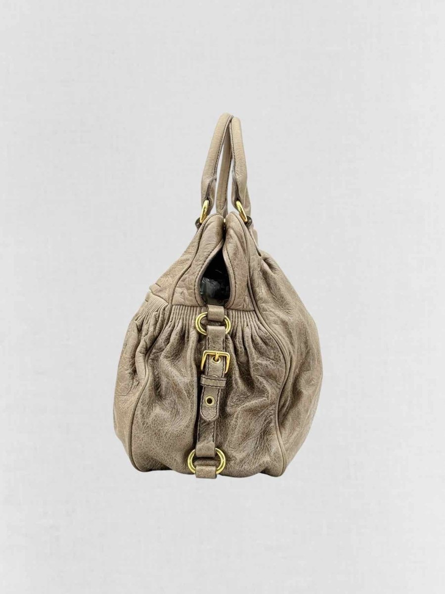 Pre - loved MIU MIU Taupe Top Handle at Reems Closet