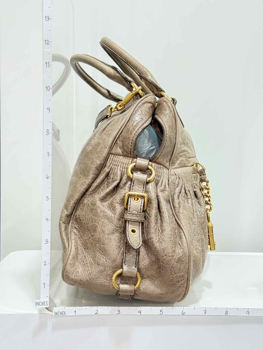 Pre - loved MIU MIU Taupe Top Handle at Reems Closet