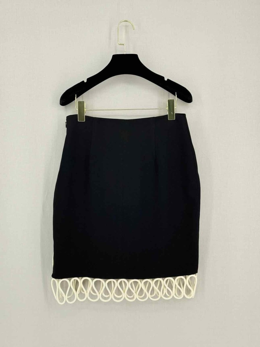 Pre-loved NAFSIKA SKOURTI Black Size US 4 Knee Length Skirt at Reems Closet