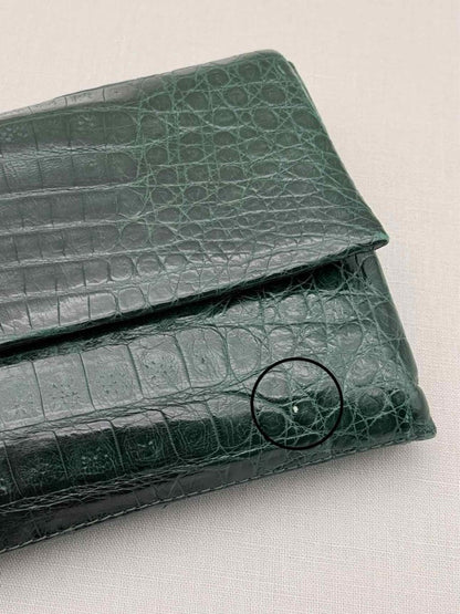 Pre-loved NANCY GONZALEZ Green Clutch at Reems Closet