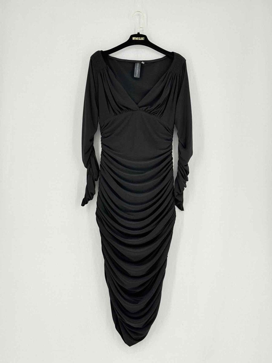 Pre - loved NORMA KAMALI Black Size Medium Knee Length Dress at Reems Closet