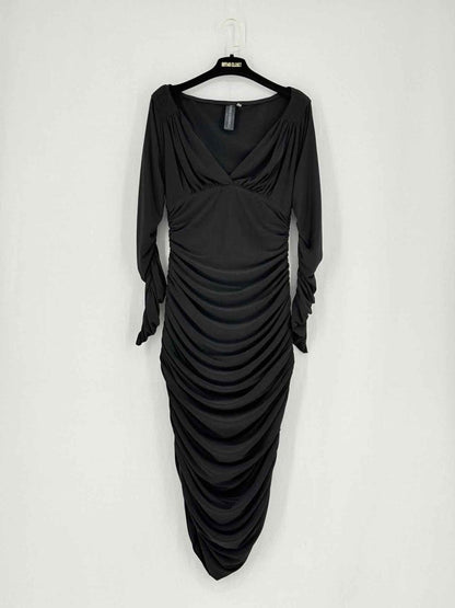 Pre - loved NORMA KAMALI Black Size Medium Knee Length Dress at Reems Closet