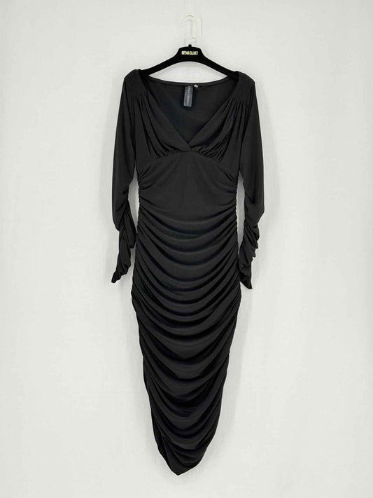 Pre - loved NORMA KAMALI Black Size Medium Knee Length Dress at Reems Closet