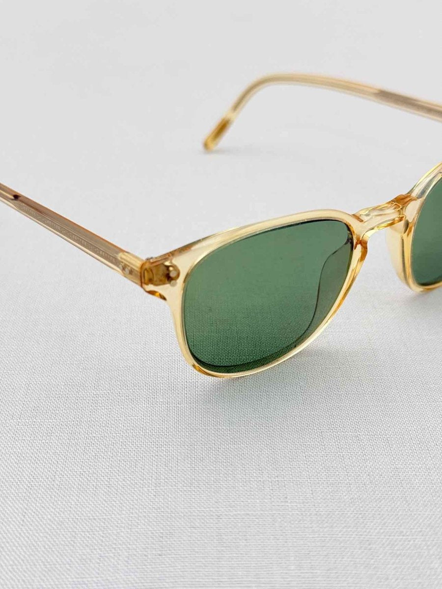 Pre-loved OLIVER PEOPLES Gold Tone Sunglasses at Reems Closet