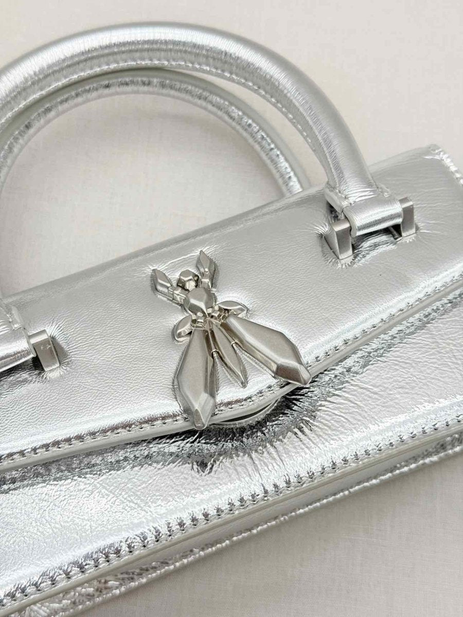 Pre - loved PATRIZIA PEPE Fly Bamby Metallic Silver Top Handle at Reems Closet