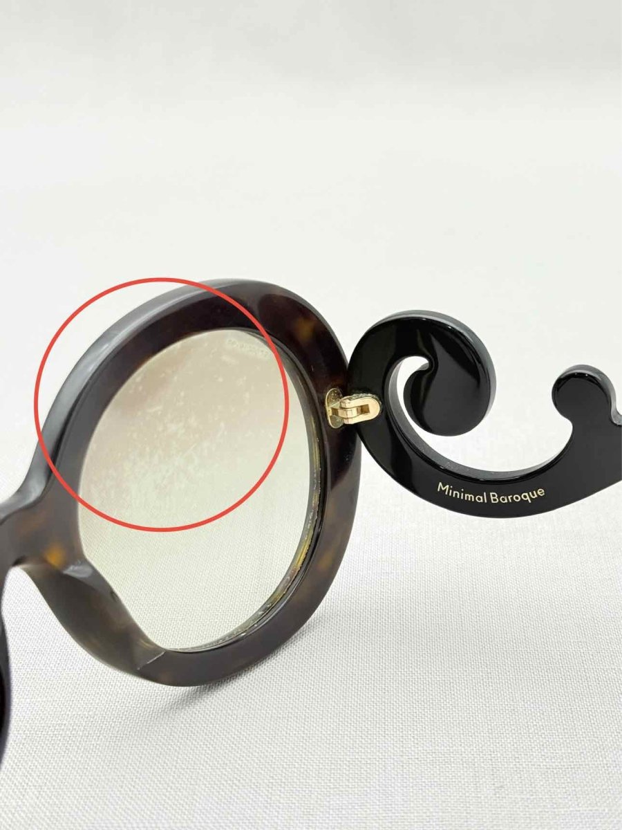 Pre - loved PRADA Black Sunglasses at Reems Closet