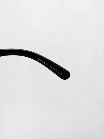 Pre-loved PRADA Black Sunglasses at Reems Closet