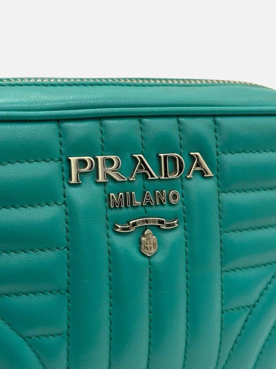 Pre - loved PRADA Diagramme Camera Turquoise Quilted Crossbody at Reems Closet