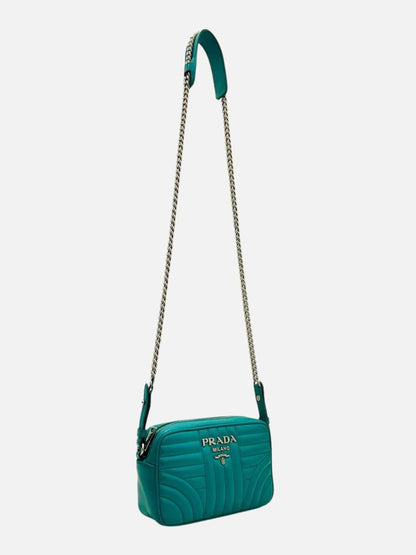 Pre - loved PRADA Diagramme Camera Turquoise Quilted Crossbody at Reems Closet