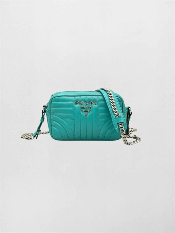 Pre-loved PRADA Diagramme Camera Turquoise Quilted Shoulder Bag at Reems Closet