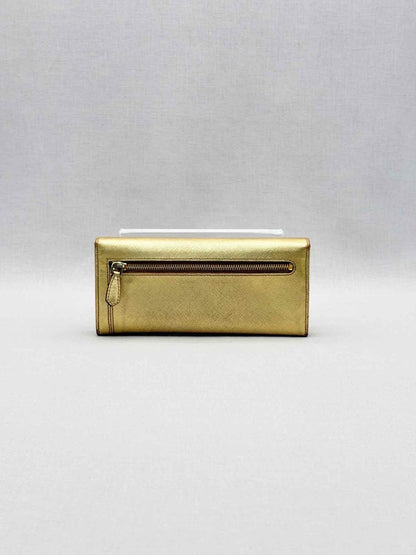 Pre-loved PRADA Gold Continental Wallet at Reems Closet