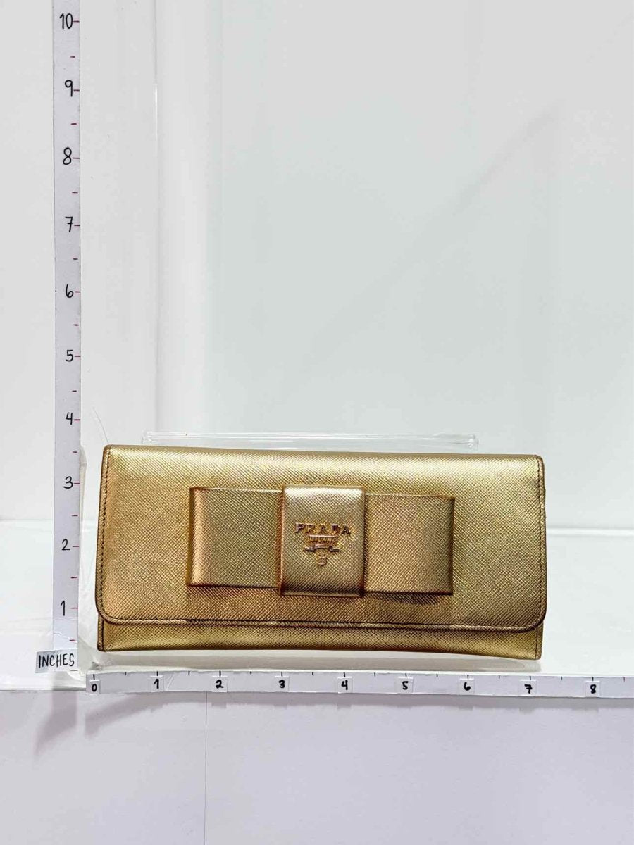Pre-loved PRADA Gold Continental Wallet at Reems Closet