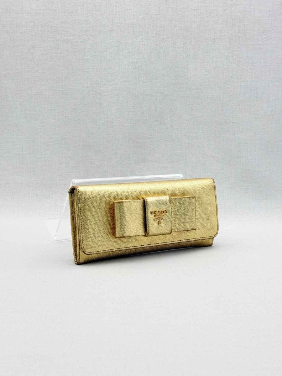 Pre-loved PRADA Gold Continental Wallet at Reems Closet